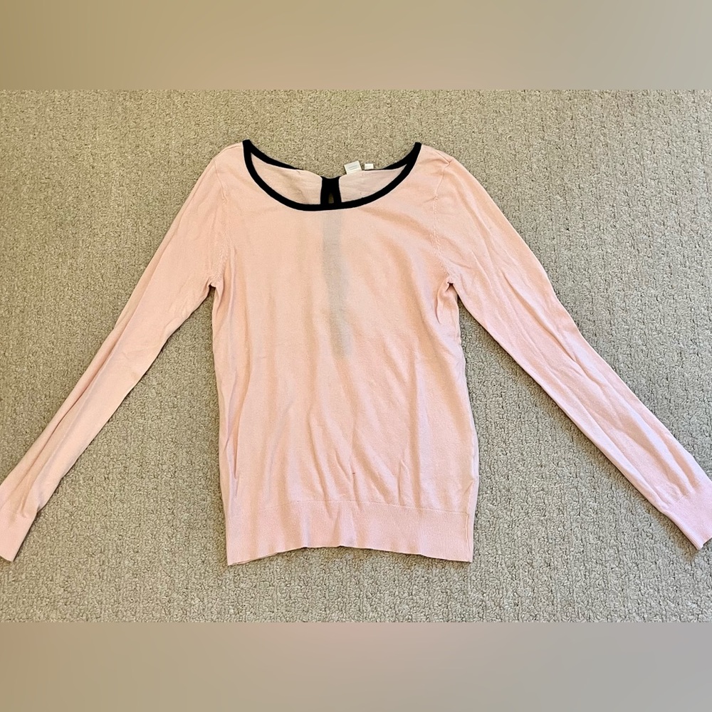 Pink top with bow detailing on the back
